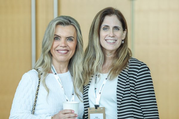 Attendees networking during a corporate event at Huntington Place in downtown Detroit