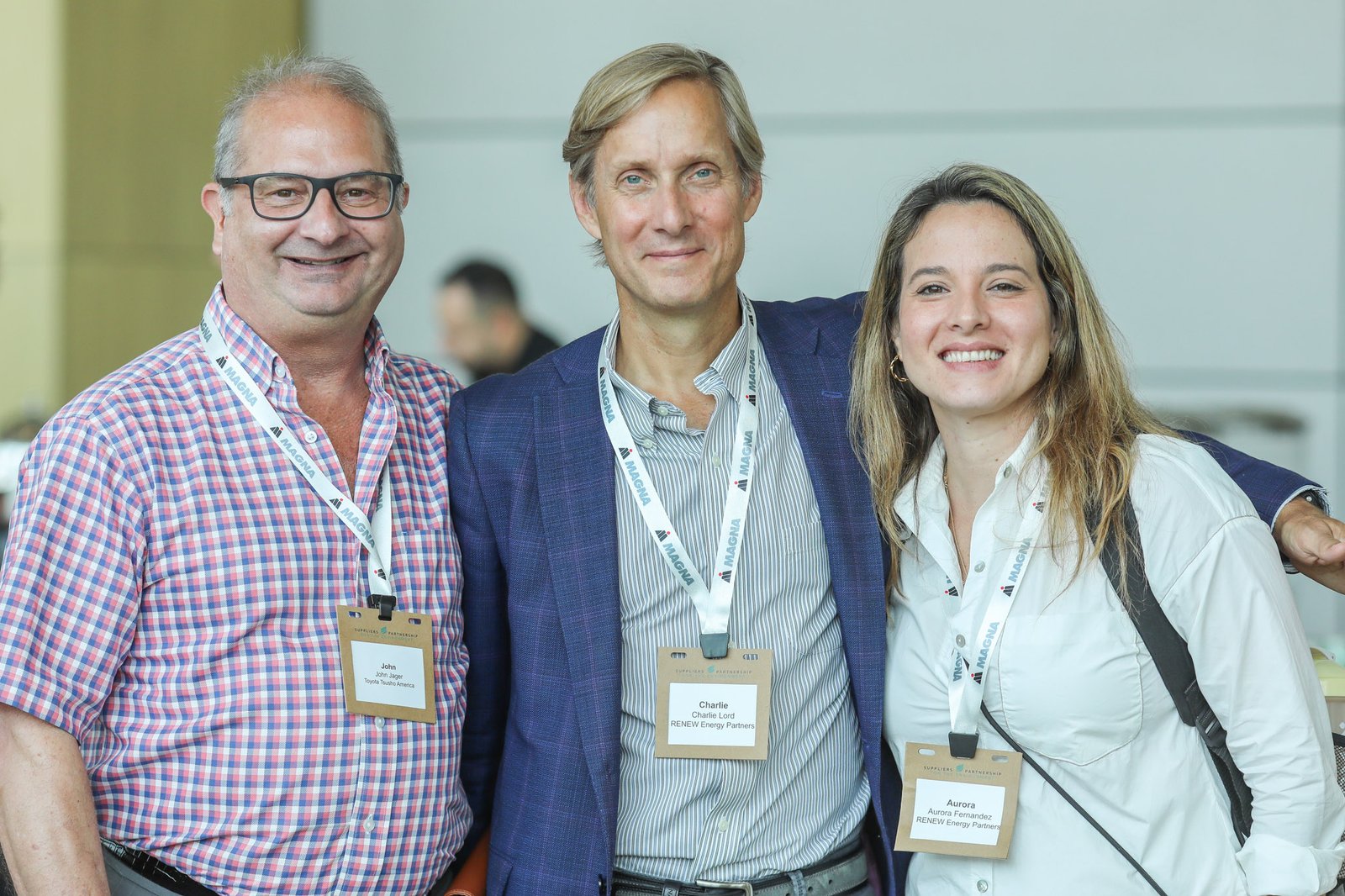 Professionals networking at a corporate conference photographed by an Oakland County event photographer -mobile