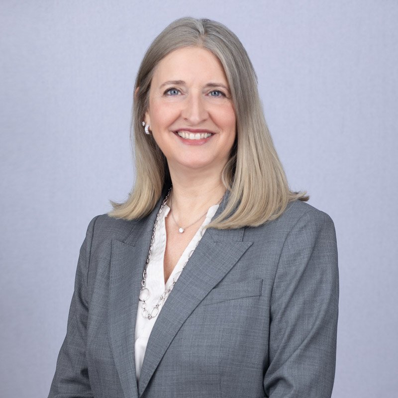 Executive receiving professional on-site headshot during corporate conference in Metro Detroit