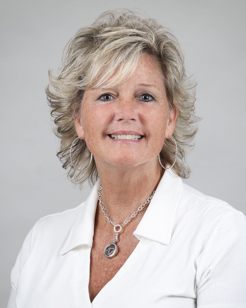 On-site corporate team headshots photographed at RouteOne headquarters in Farmington Hills, Michigan. Consistent, professional staff headshots captured with a mobile studio setup.-3