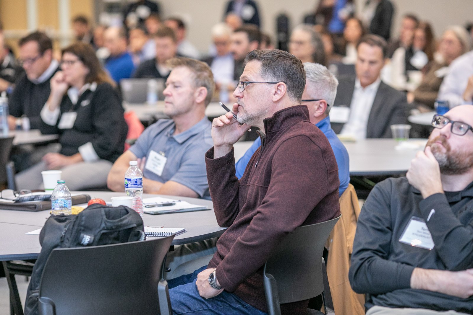 Audience attending corporate conference session in Detroit Michigan event photography