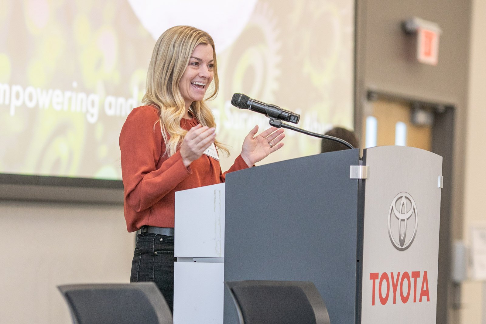 Speaker presenting at Toyota corporate conference event in Michigan