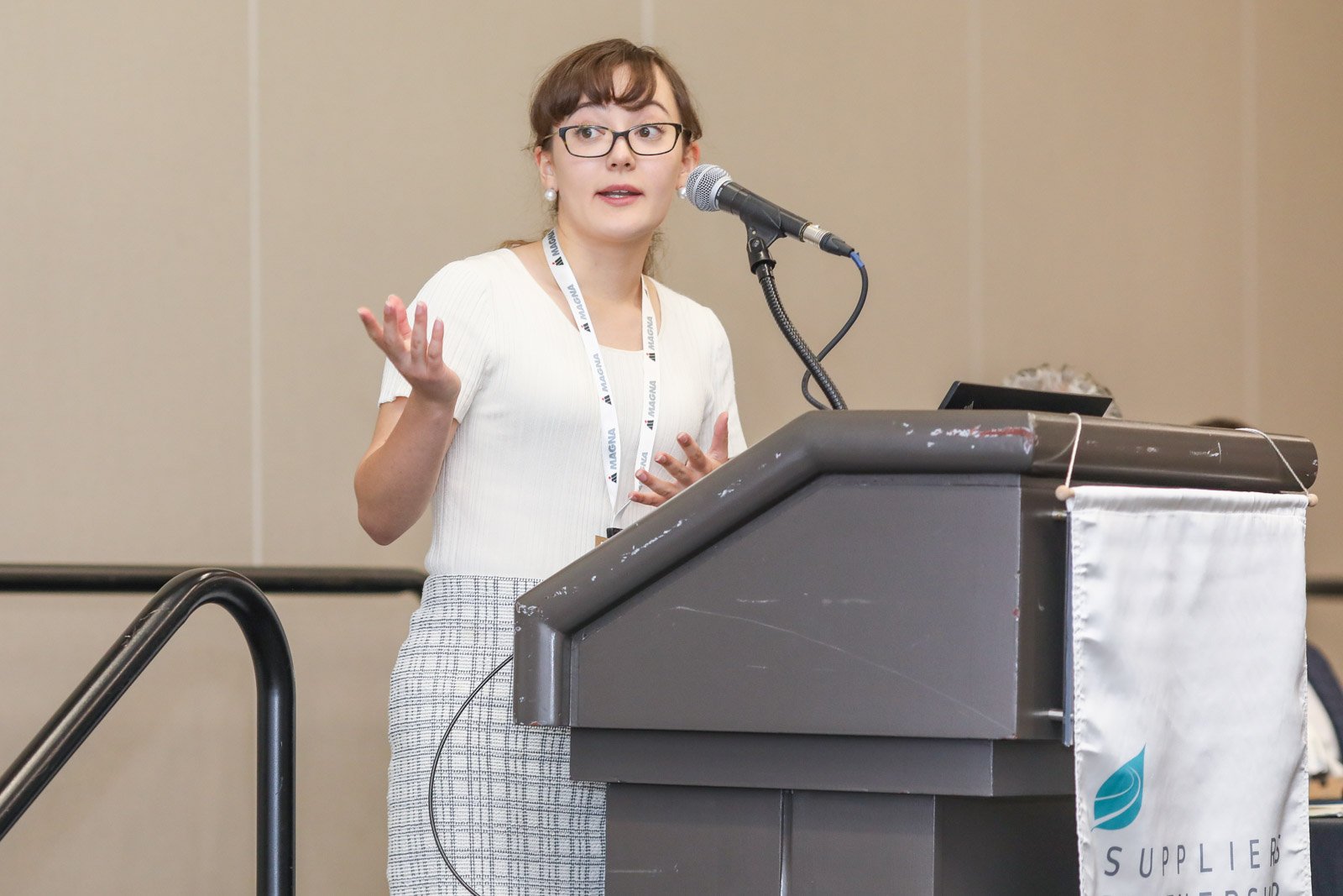 Speaker presenting at business conference event in Michigan professional event photography, Huntington Place.