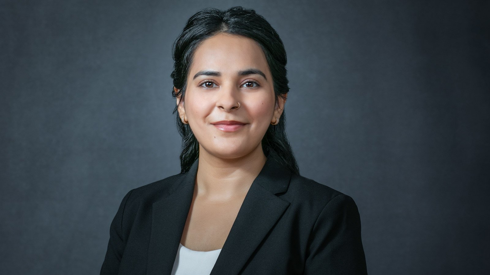 professional corporate headshot example business attire neutral background