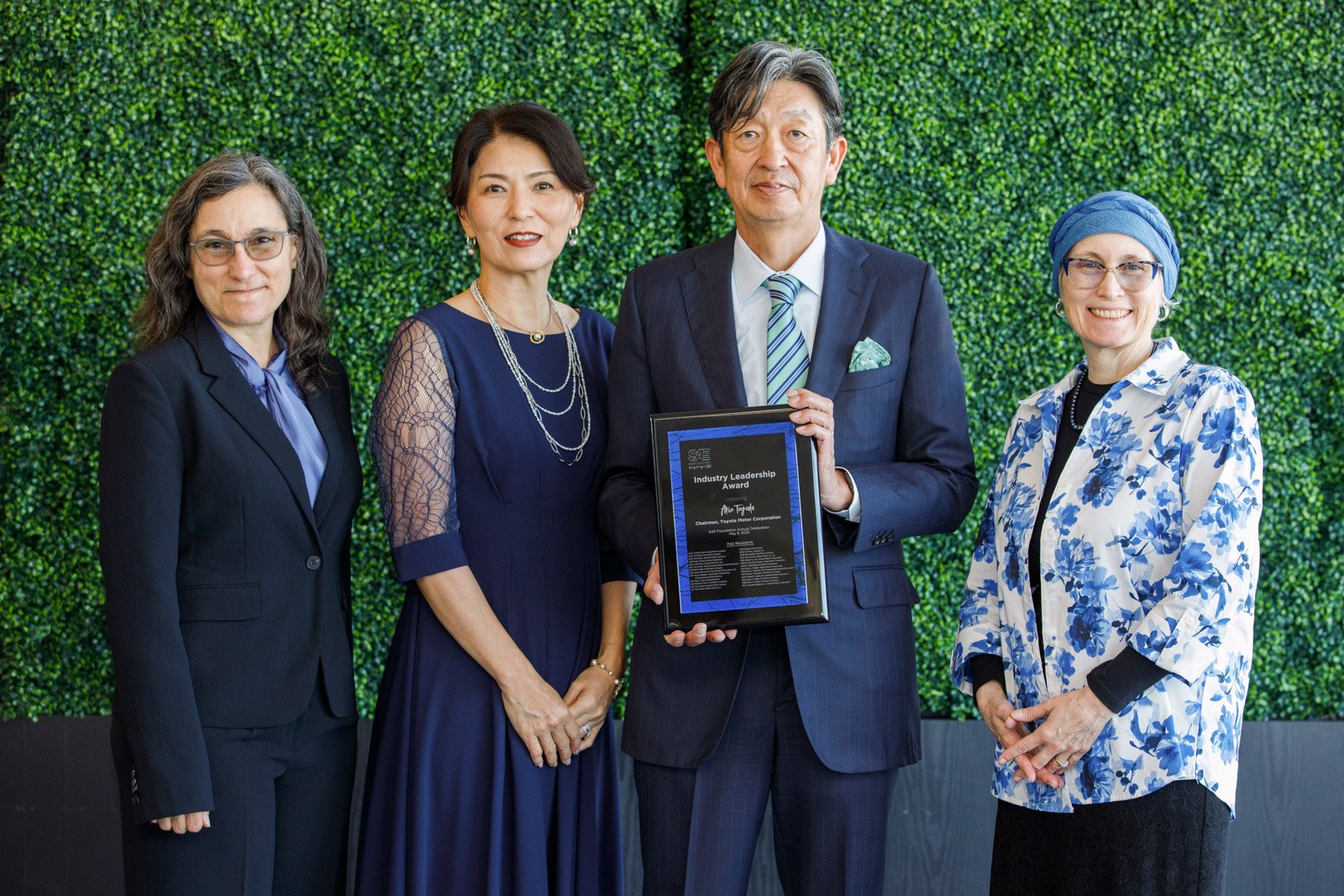 Executive award ceremony photography at corporate event featuring industry leadership in Pontiac and Detroit