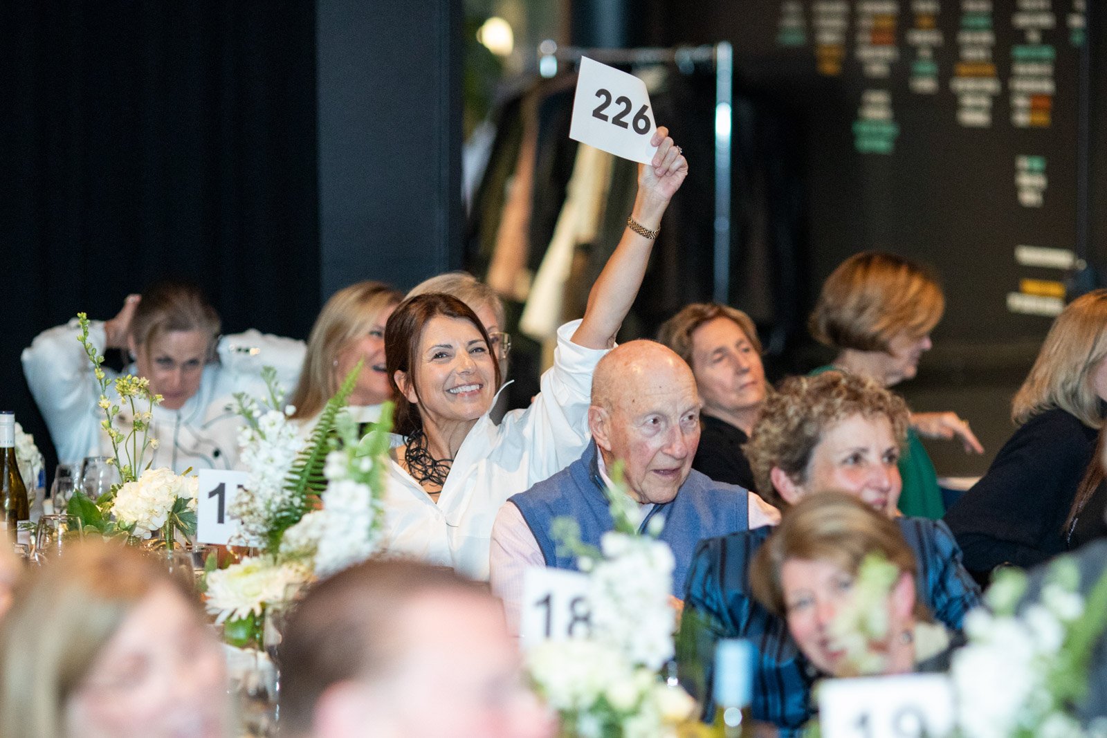 Bidder wins at a chrity auction bid