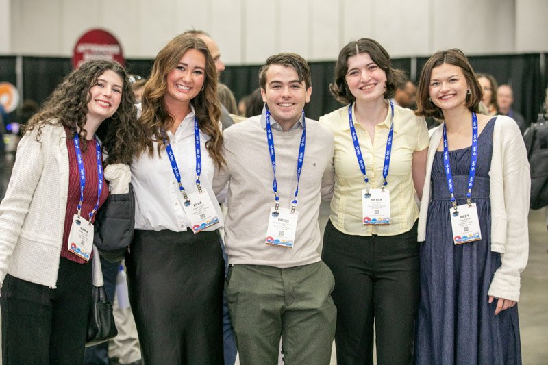 Conference attendees networking during a corporate event