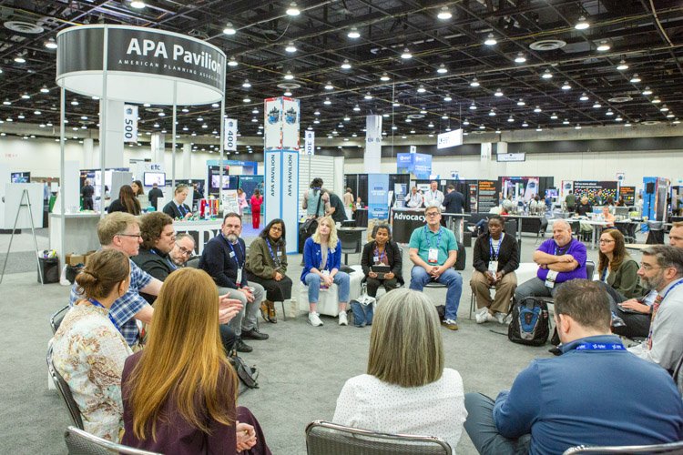 Conference attendees participating in a roundtable discussion during the APA National Planning Conference at Huntington Place in Detroit