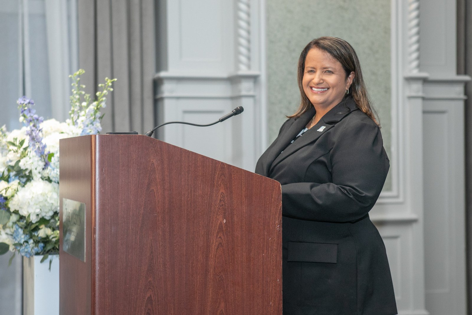 Speaker addressing attendees during the SAE Fellows Reception and Dinner at The Westin Book Cadillac.