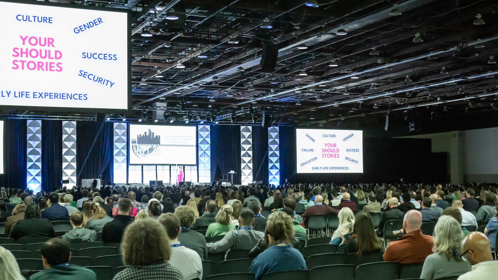 Paralympic silver medalist speaking on stage during a corporate conference at Huntington Place in Detroit, photographed by Hugh Anderson Photography.