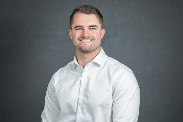 Corporate professional photographed during a company headshot clinic.