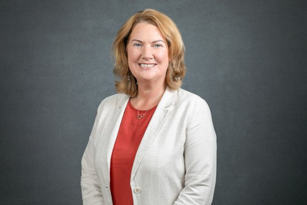 Executive business portrait created at a professional conference headshot clinic.