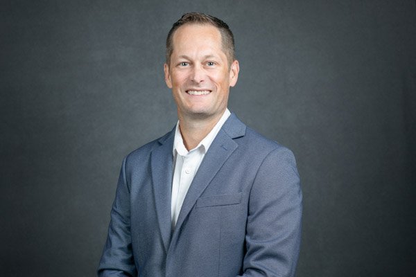 Professional business headshot photographed during an on-site corporate headshot clinic in Metro Detroit.