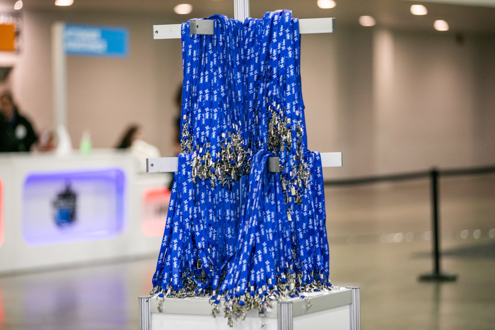 Registration lanyards ready for attendees at Huntington Place in Detroit before a corporate conference.