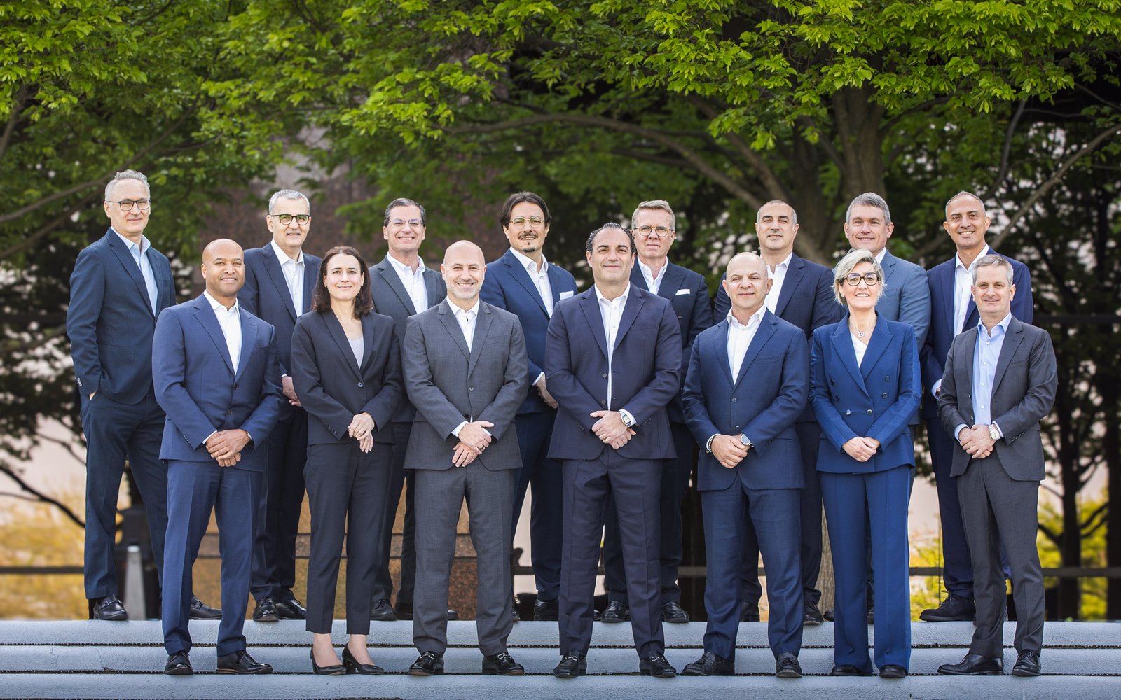 Corporate group photo of the Stellantis Investor Day team in Detroit