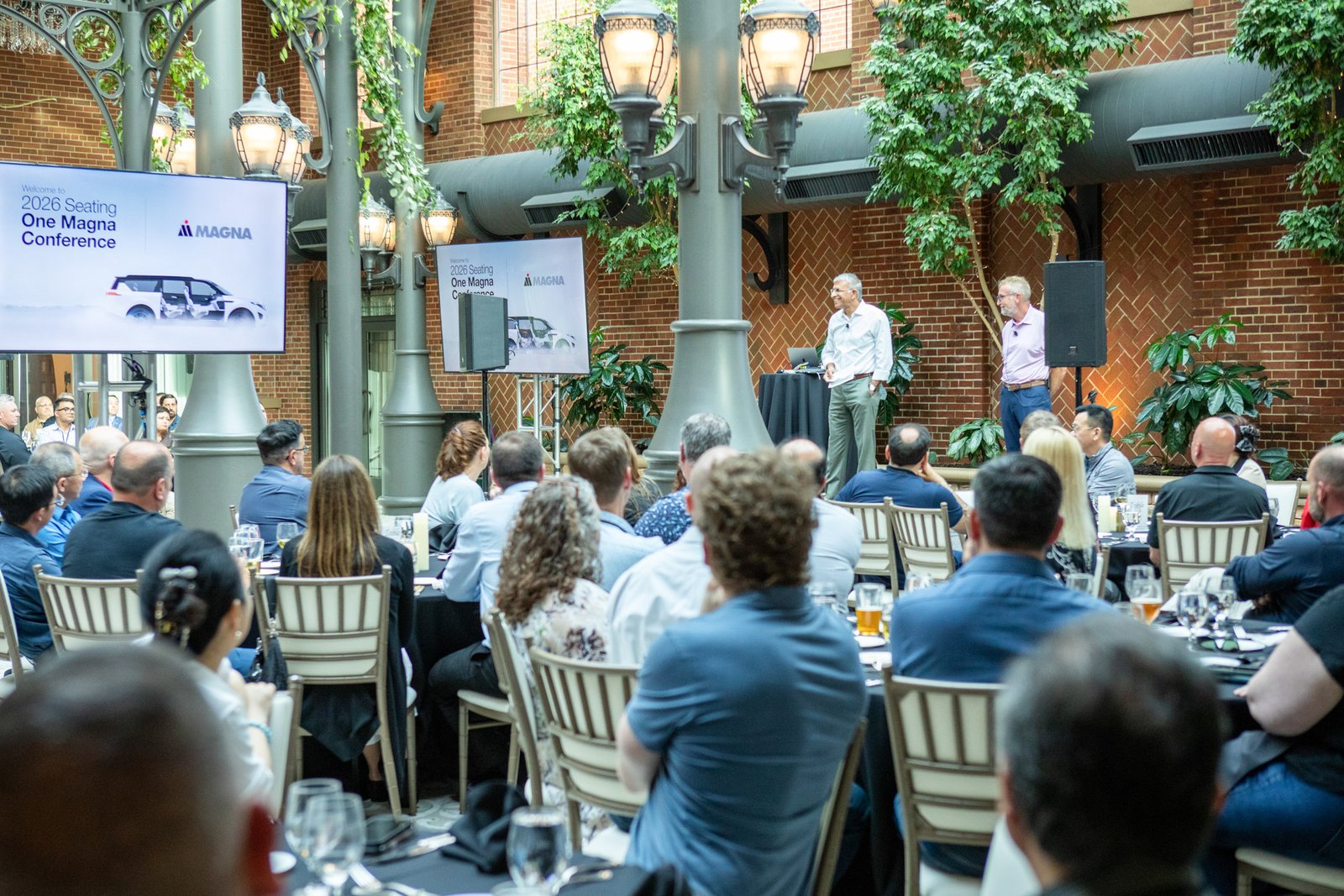 Professional keynote speaker presenting on stage during a corporate conference at Saint John's Resort.