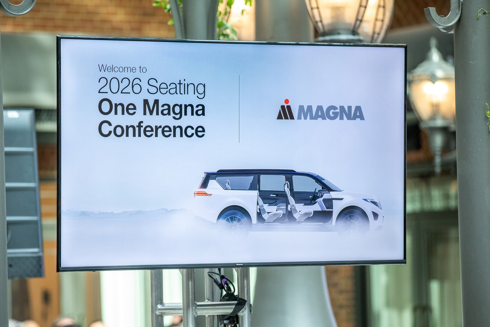 Conference branding display welcoming attendees to the One Magna Conference at Saint John's Resort.