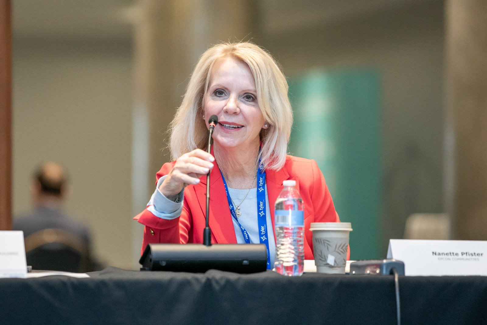 Woman speaking during a corporate conference at the Detroit Marriott in downtown Detroit