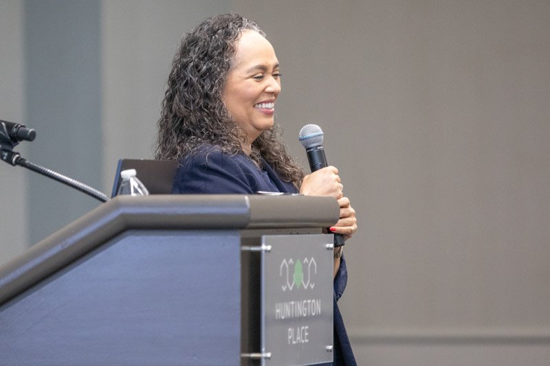 Conference speaker presenting at Huntington Place in Detroit