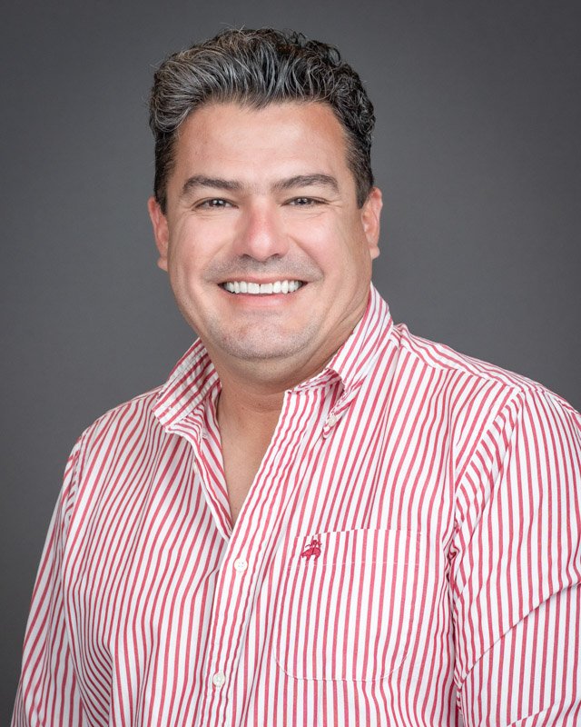 Professional employee headshot photographed during an on-site Magna Seating team headshot session