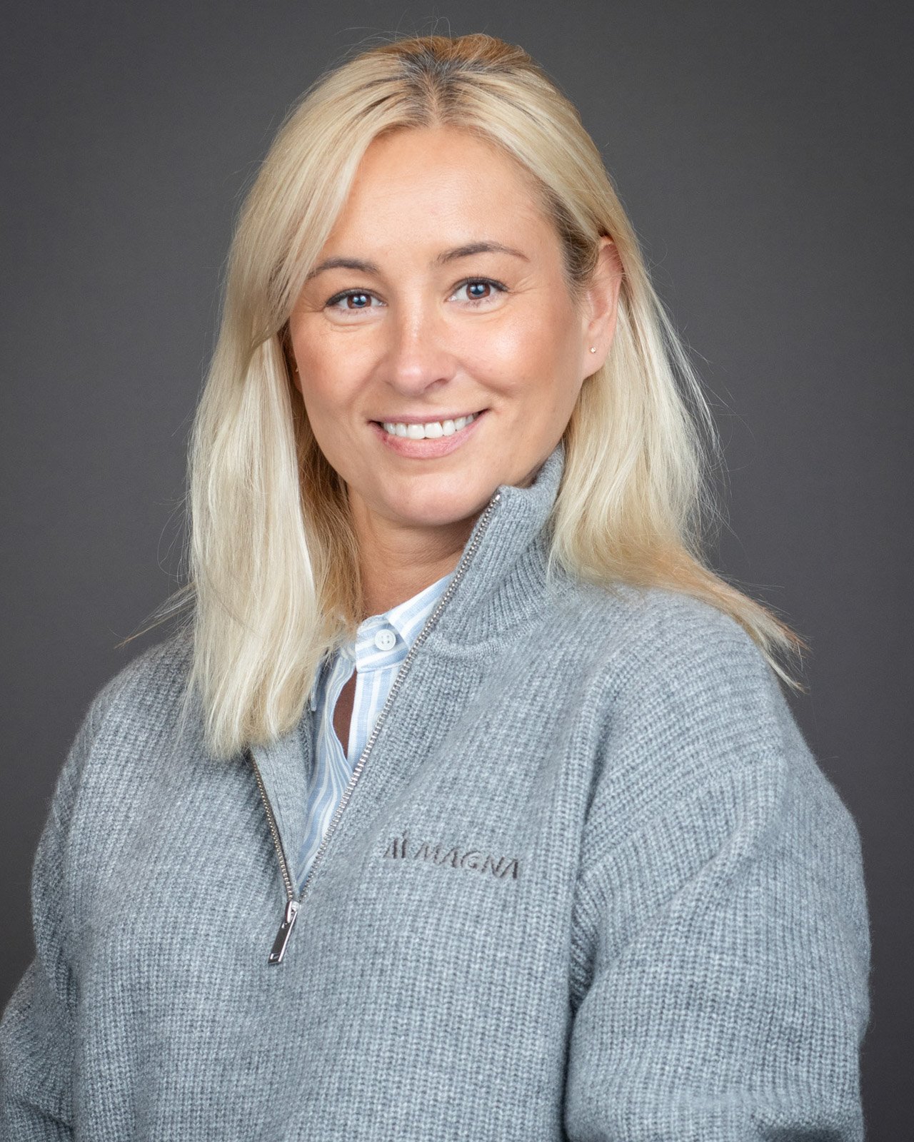 On-site employee headshot photographed for Magna Seating during a corporate team headshot session in Troy, Michigan