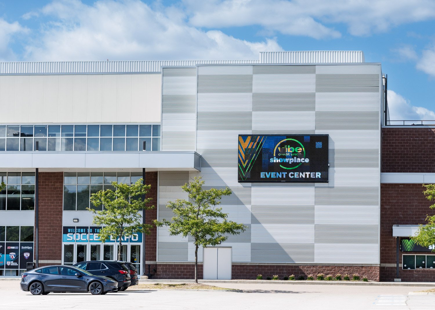 Exterior of Vibe Credit Union Showplace Event Center in Novi, Michigan, a leading venue for conferences, trade shows and corporate events. Mobile View