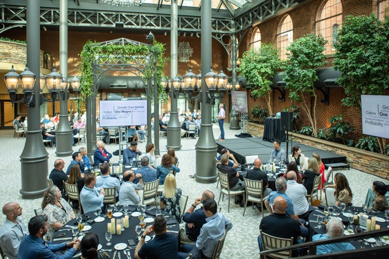 Wide view of attendees during a corporate conference at Saint John's Resort