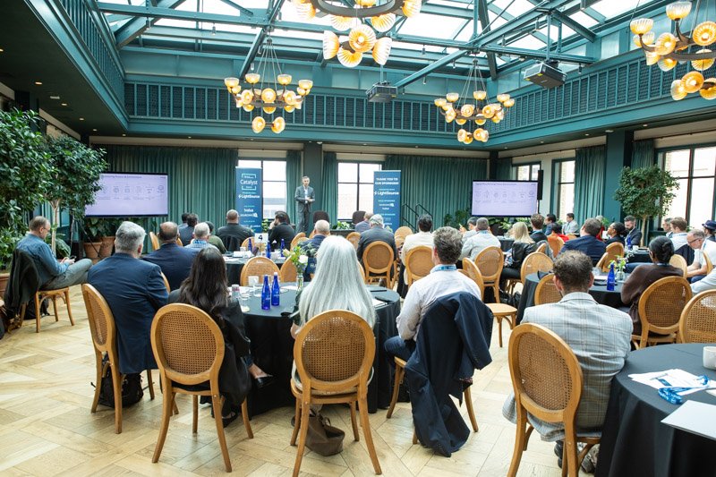 Corporate conference presentation with attendees at Book Tower in downtown Detroit