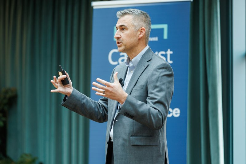 Executive delivering a presentation during a corporate event in Detroit