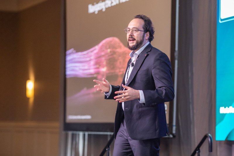 Sheldon Yellen, CEO of BELFOR Property Restoration, delivering a keynote presentation during the Suppliers Partnership for the Environment Innovation Summit at Vibe Credit Union Showplace in Novi, Michigan.
