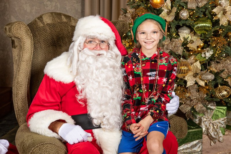 Santa portrait during a corporate holiday family event at San Marino Club in Troy