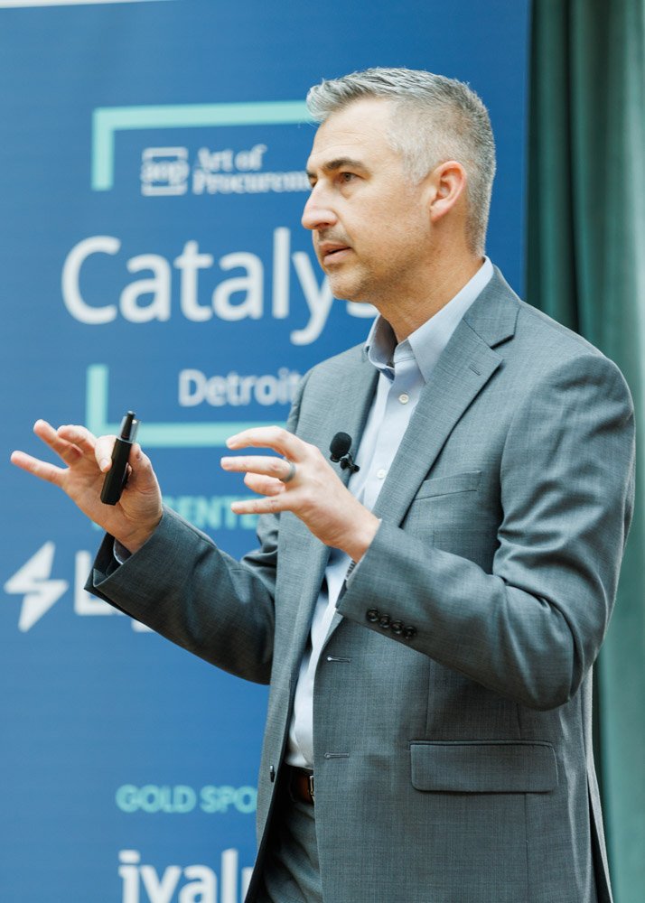 Speaker presenting at a corporate event at Book Tower in downtown Detroit