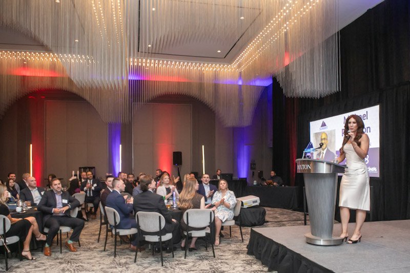 Speaker addressing guests during a corporate event at Daxton Hotel in Birmingham